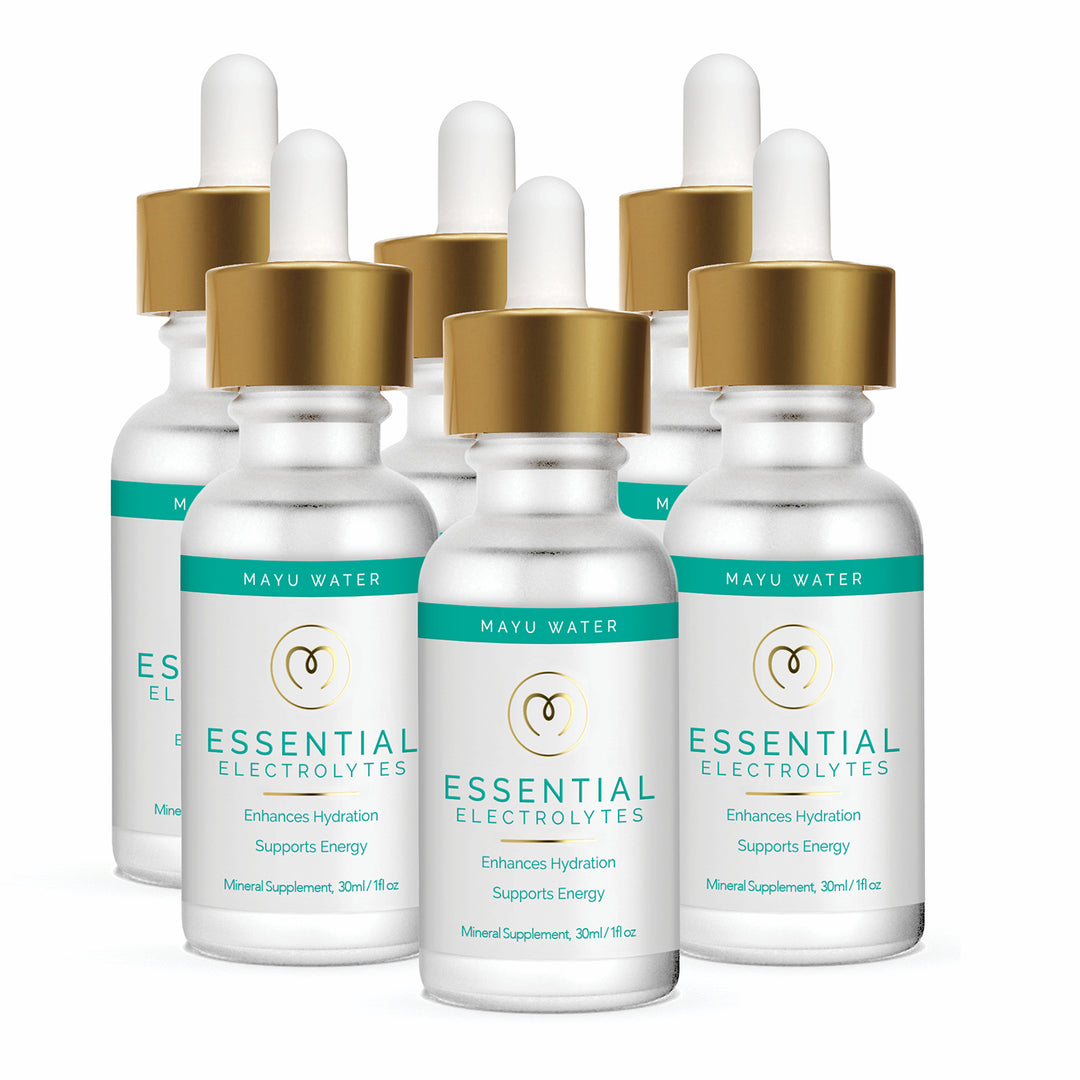 Six bottles of Mayu Water Electrolyte Drops, each with white labels accented in teal and gold and topped with gold dropper caps, are grouped together. The label promotes rapid hydration and energy support benefits.