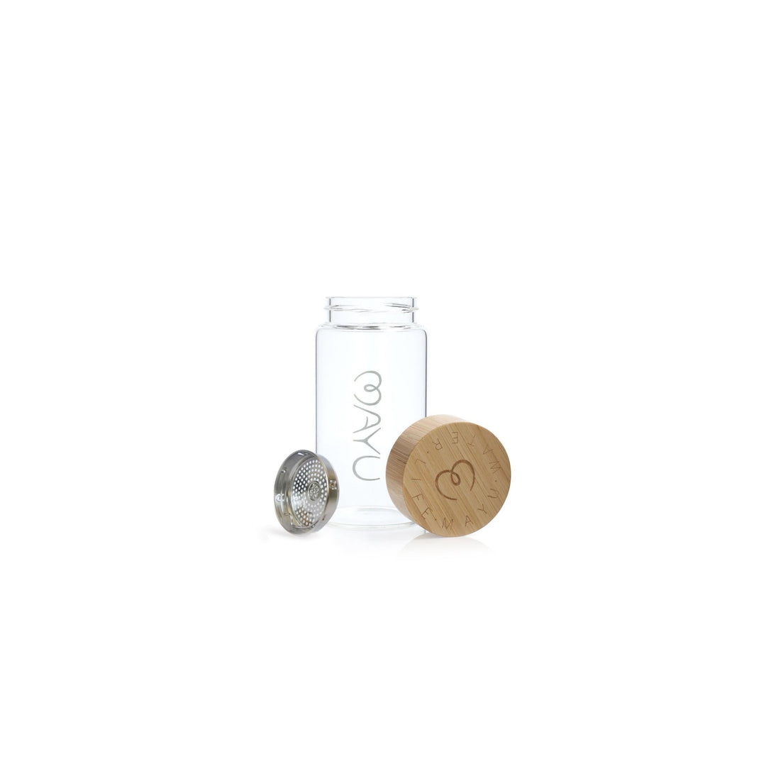 The Pure Glass Bottle by Mayu Water features clear glass, a bamboo lid engraved with a heart and symbols, a metal infuser, and OYAÜ text. All parts are BPA free and eco-friendly, shown on a white background.