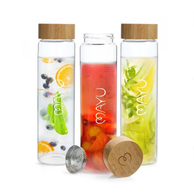 Elevate hydration with the Mayu Water Pure Glass 1.5L Bottle - Pack of 3: sustainable borosilicate bottles with bamboo lids. Infuse water with citrus & blueberries, strawberries, or cucumber & mint for a fresh, eco-friendly experience.
