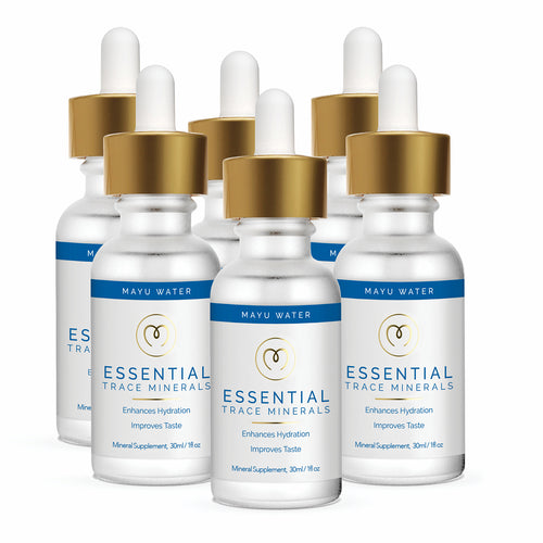 Six bottles of Mayu Water Essential Minerals with gold droppers and white labels are arranged in two rows. These supplements support hydration, enhance taste, and promote bone health.