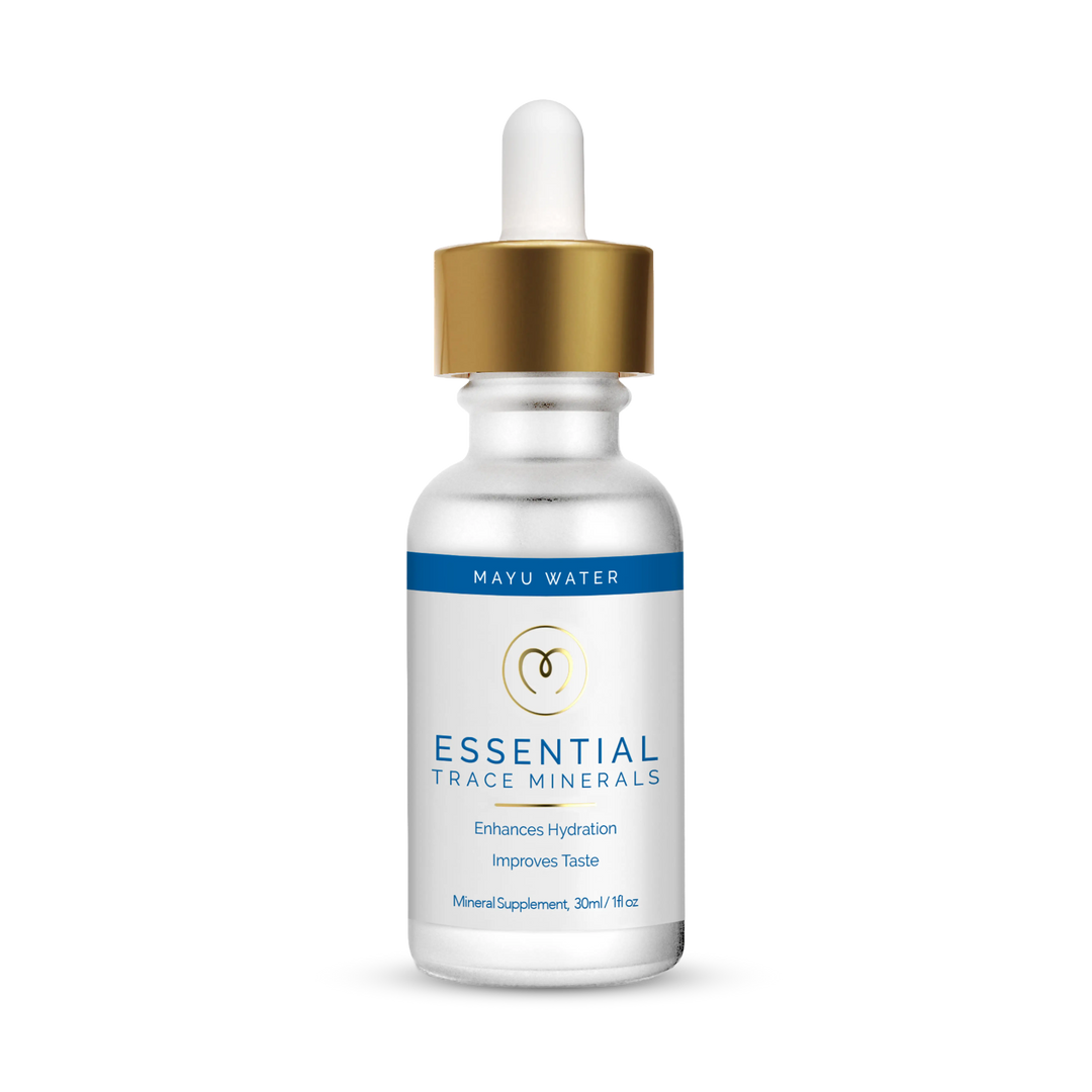 A small frosted glass dropper bottle labeled Trace Mineral Drops by Mayu Water, featuring a gold and white dropper cap with blue accents, stands upright on a plain white background.