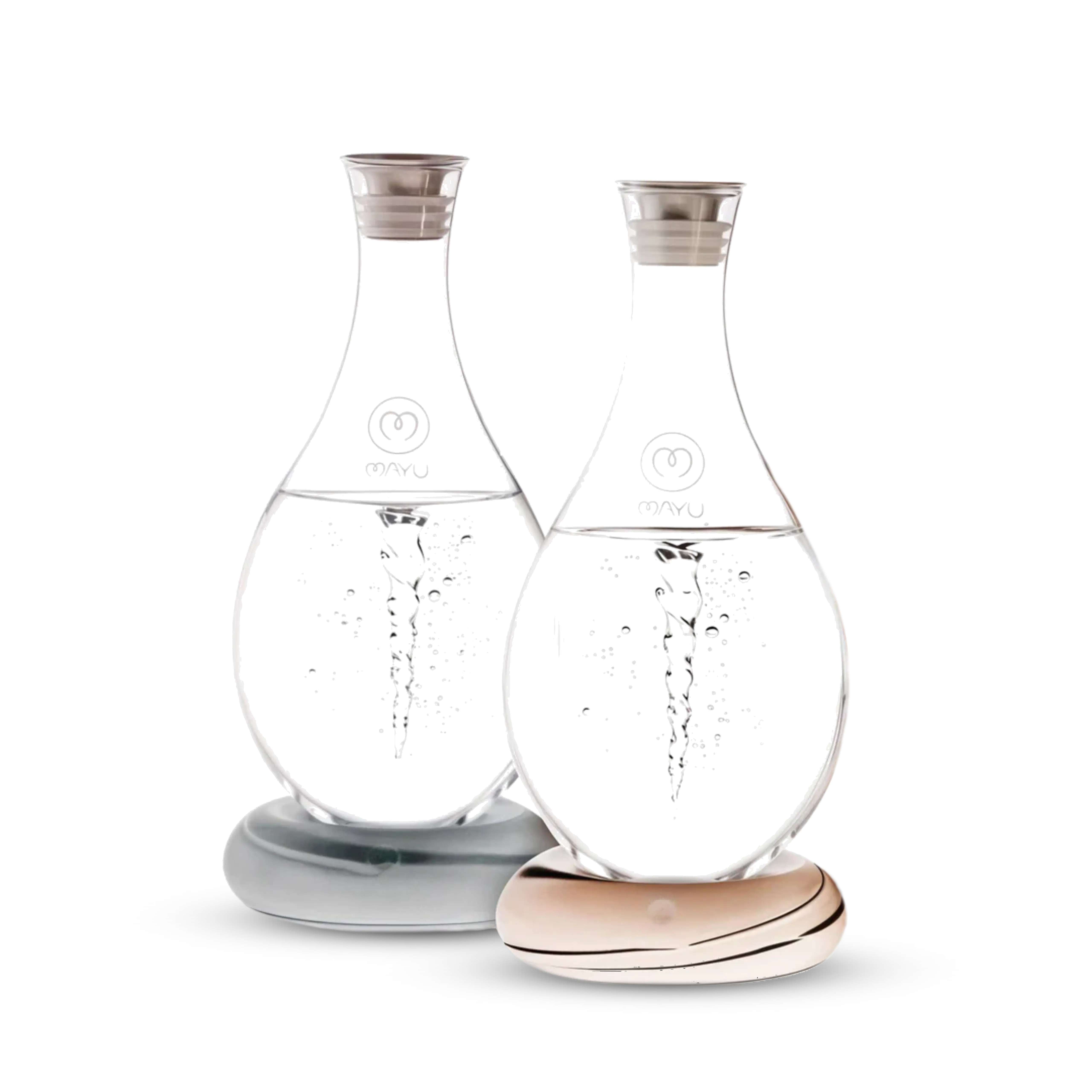 The Mayu Water Swirl Structured Water Carafe - Pack of 2 features handblown borosilicate glass carafes with grey and white bases, narrow necks, silver lids, and are shown side by side against a white background.