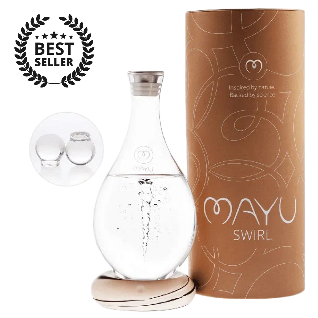 The MAYU Swirl Carafe by Mayu Water, shown beside its cylindrical brown packaging and two glass spheres, features a swirling vortex to enhance drinking water quality. It’s displayed with a “Best Seller” badge.