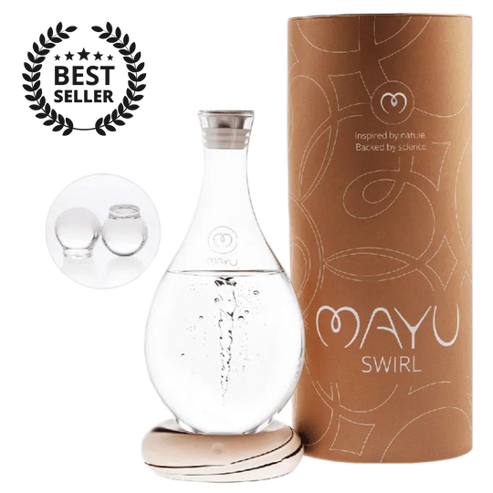 The MAYU Swirl Carafe by Mayu Water, shown beside its cylindrical brown packaging and two glass spheres, features a swirling vortex to enhance drinking water quality. It’s displayed with a “Best Seller” badge.