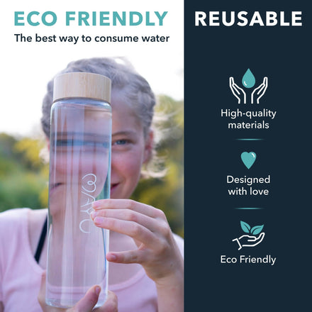 A person holds the Mayu Water Pure Glass 1.5L Bottle - Pack of 3 with a bamboo lid. On the left, text reads ECO FRIENDLY, The best way to consume water; on the right, reusability, quality, design, and sustainability are featured.